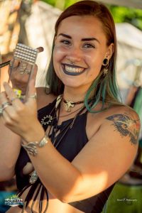 girl doing makeup at mountain music festival 2017 at ace adventure resort