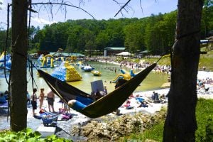 relaxing in a hammock at wonderland waterpark at ace adventure resort during mountain music festival 