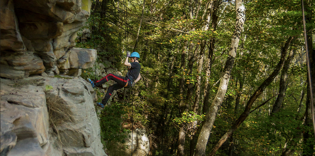 Rappelling and rock climbing on ACE Adventure Resort's private property climbing area in Oak Hill, West Virginia.