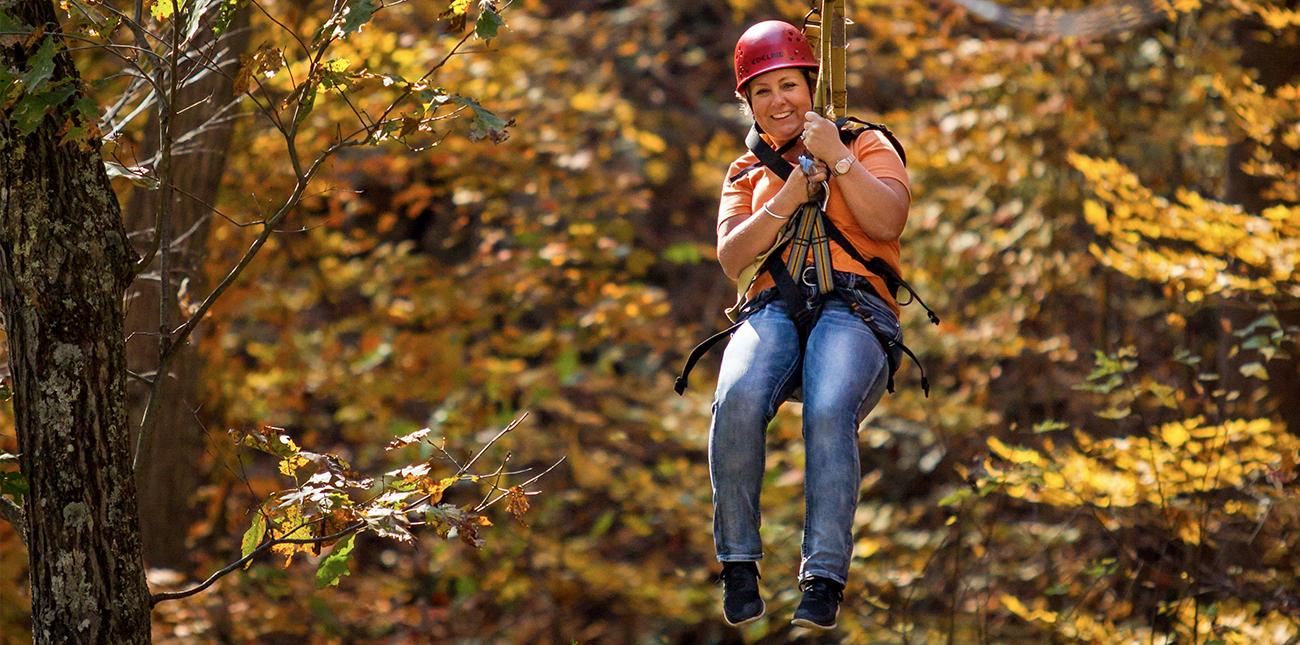 Fall zip lining in WV on a guided tour with ACE Adventure Resort in Oak Hill, West Virginia.