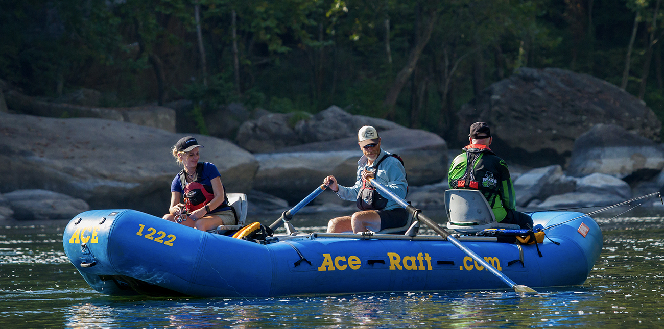 An oar boat takes guests on a guided fishing tour of the New River with ACE Adventure Resort in the New River Gorge in West Virginia.