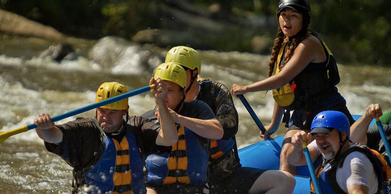 Sam Hood guides her raft through Lower Mash on the Upper Gauley River in West Virginia.