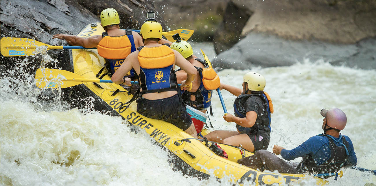 ACE Adventure Resort raft guide Josh Sapio on the Upper Gauley River at a class V rapid.