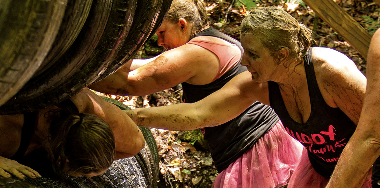 Gritty Chix athletes tackle the tires during the 2018 Gritty Chix Mud Run at ACE Adventure Resort in Southern West Virginia.