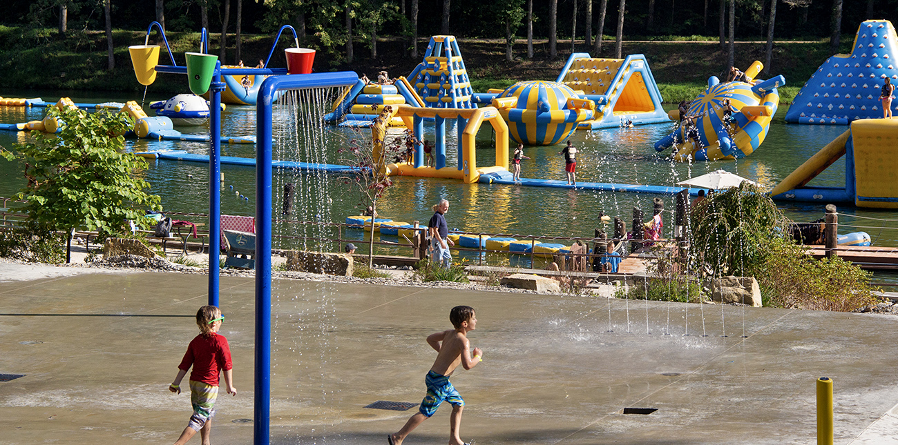 Playing on the splash pad for younger children at Wonderland Waterpark at ACE Adventure Resort in Oak Hill, WV.