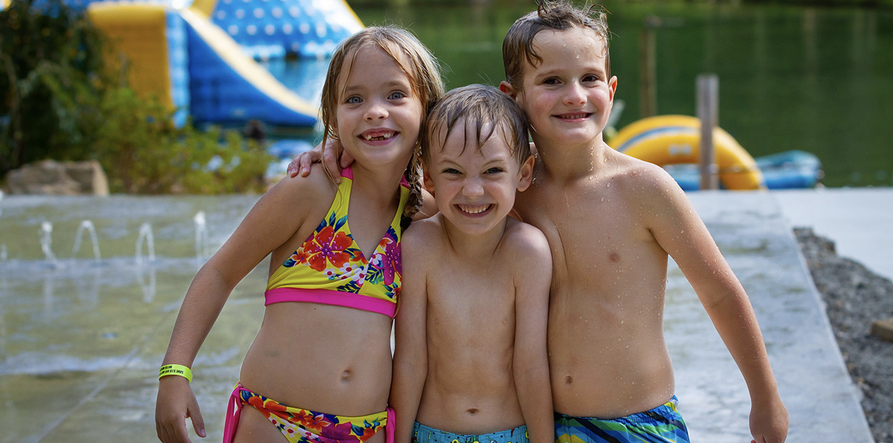 Kids playing on the splash pad at the water park at ACE Adventure Resort in West Virginia.