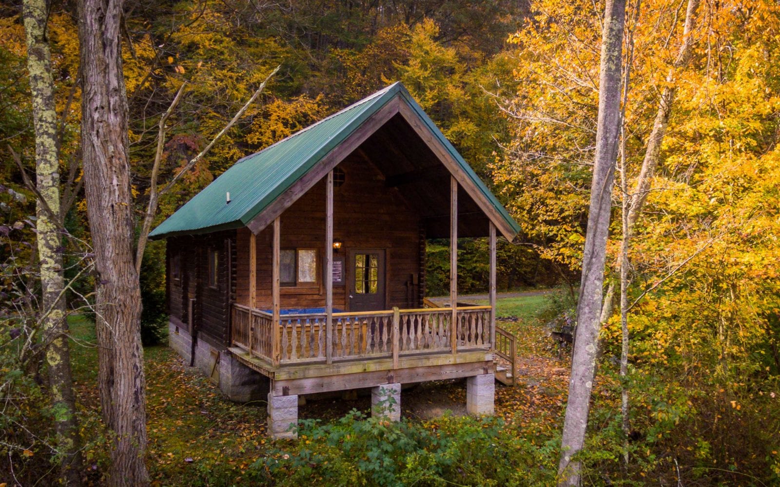 An aerial shot of the 2 bedroom log cottage one of ACE Adventure Resort’s New River Gorge, West Virginia cabin rentals.