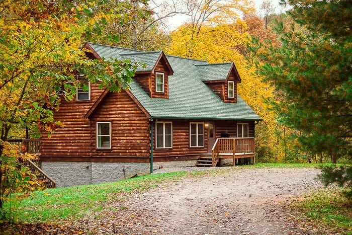 An exterior shot of the red fox log home one of ACE's largest New River Gorge, West Virginia cabin rentals.