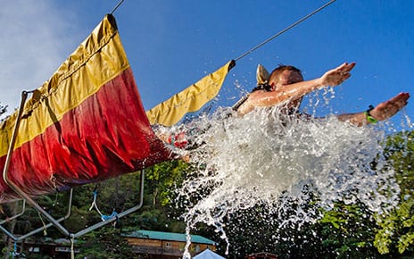 A guest flies through the air from a waterslide at wonderland water park in west virginia.