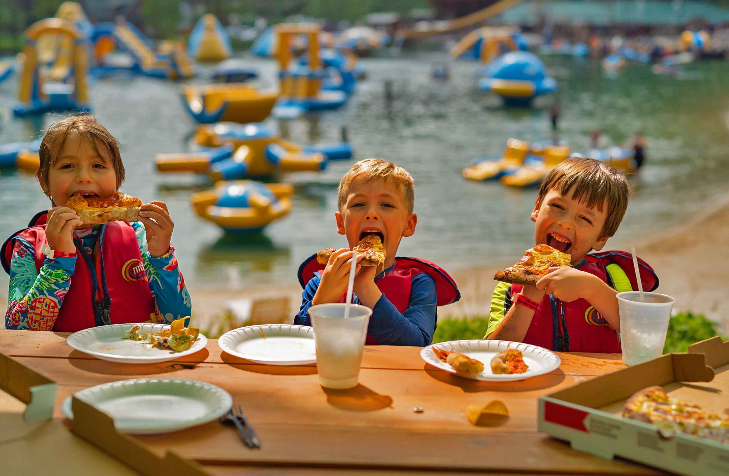 Kids enjoy a brick oven pizza party at ACE Adventure Resorts West Virginia Water Park.