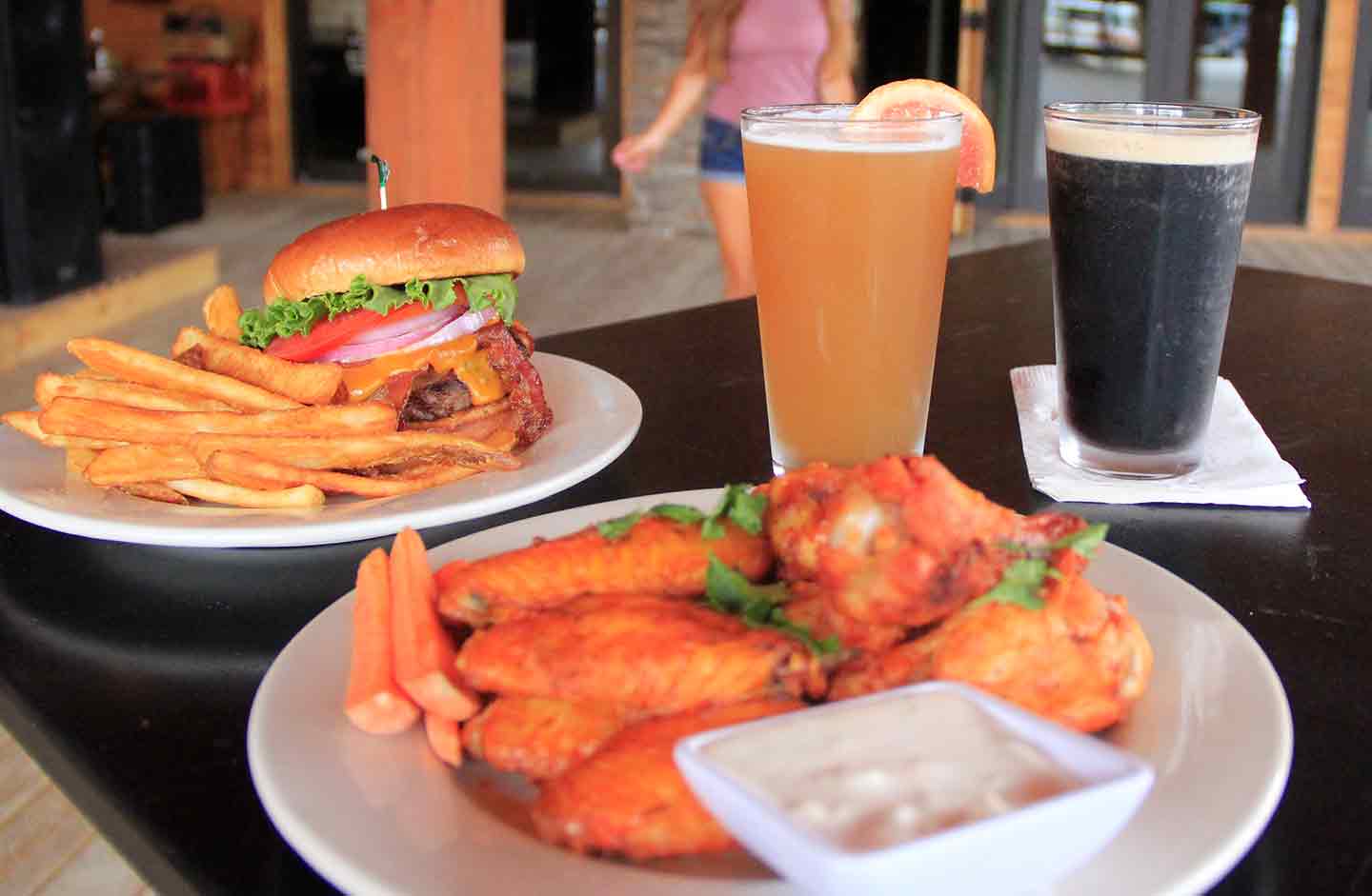 Wings, burgers, drinks, and more are served at the Lost Paddle