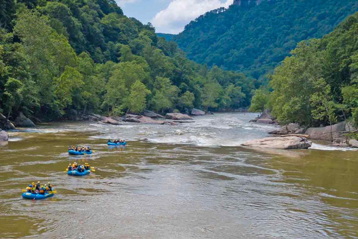Spring time brings the biggest waves you find on a New River Gorge white water rafting trip in West Virginia with ACE Adventure Resort