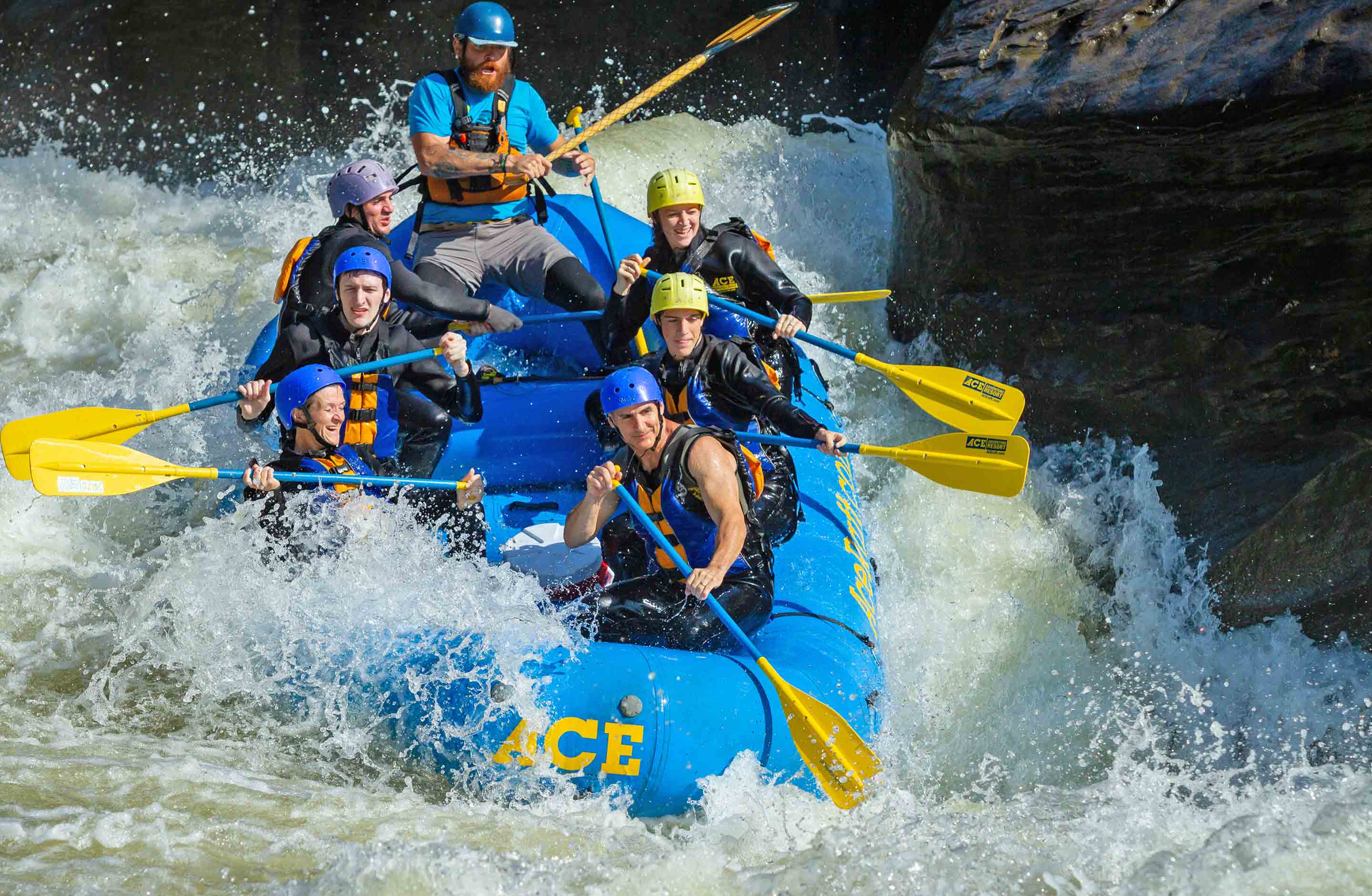 Rafting Pillow Rock rapid on the Upper Gauley RIver on a guided white water tour with ACE.