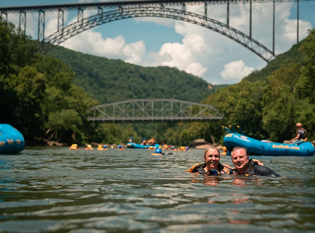Rafters with the New River Gorge Bridge for the West Virginia Travel Guide