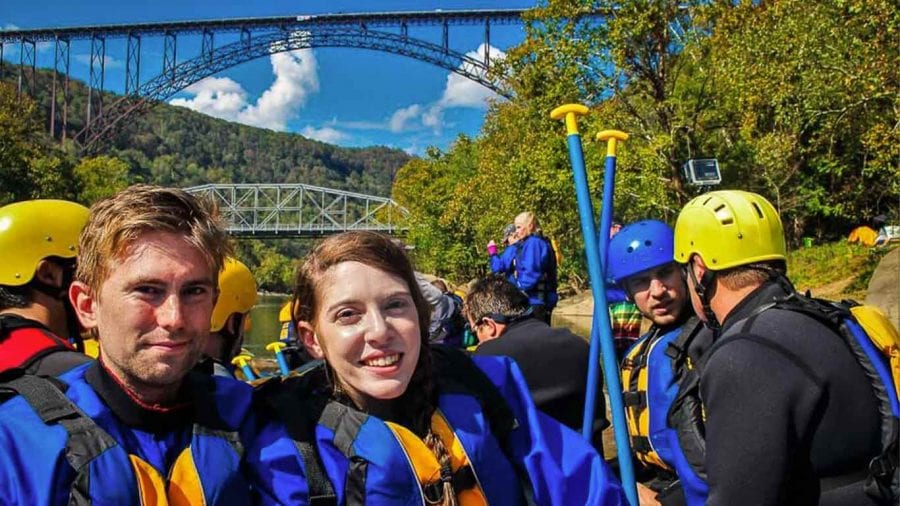 Rafting trip with New River Gorge Bridge in the background