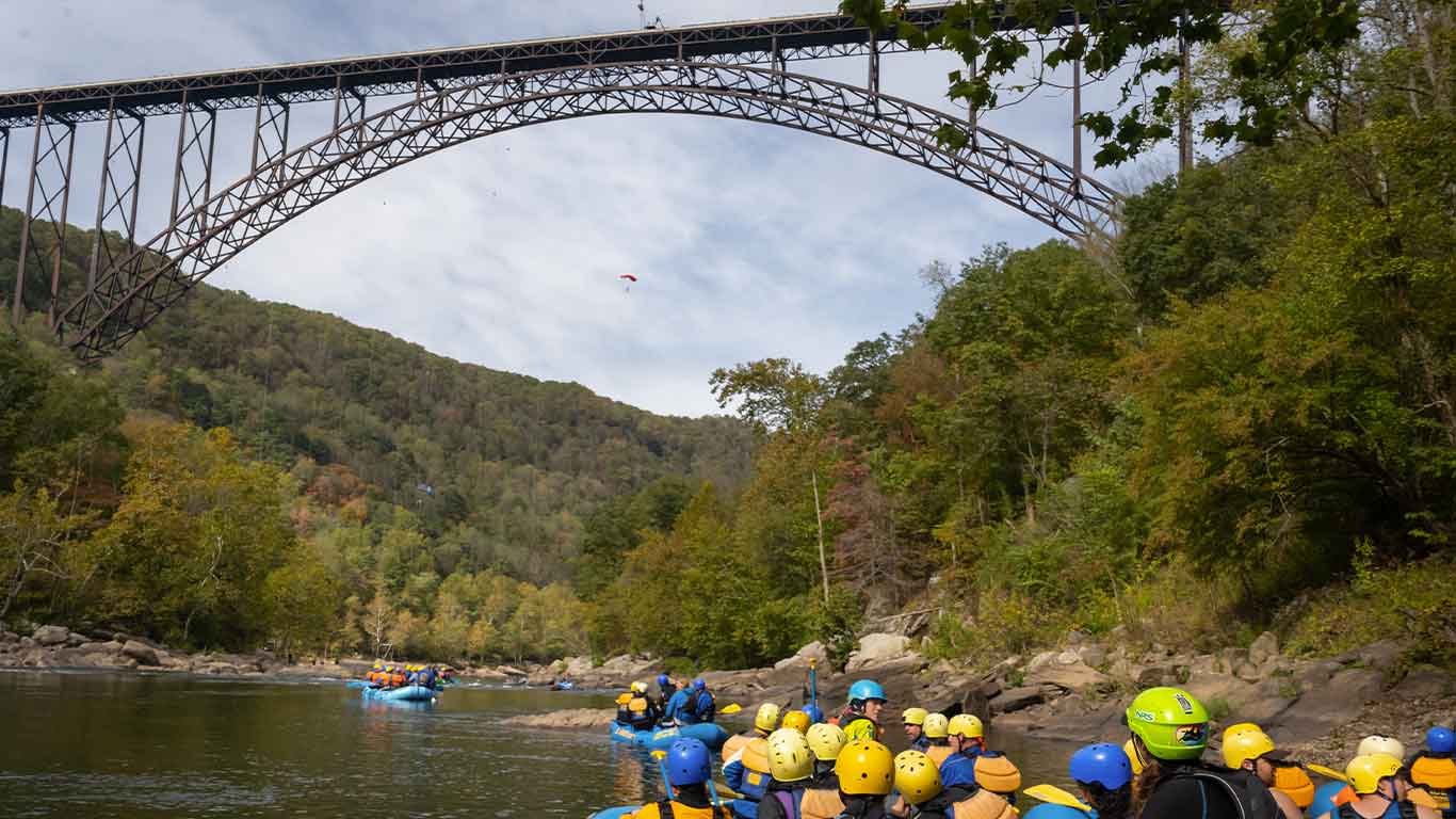Rafting trip with the New River Gorge Bridge in the background