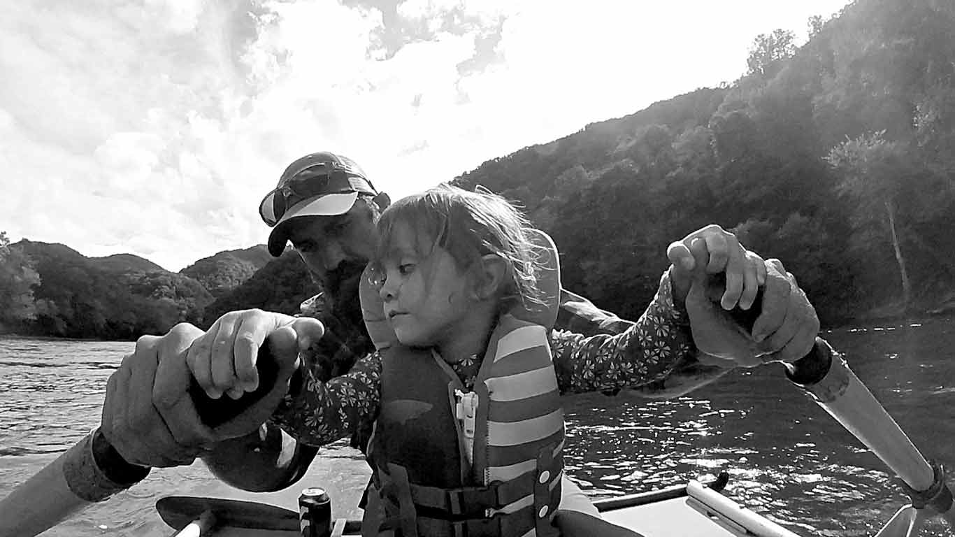 Father rafting with his daughter on the Upper New