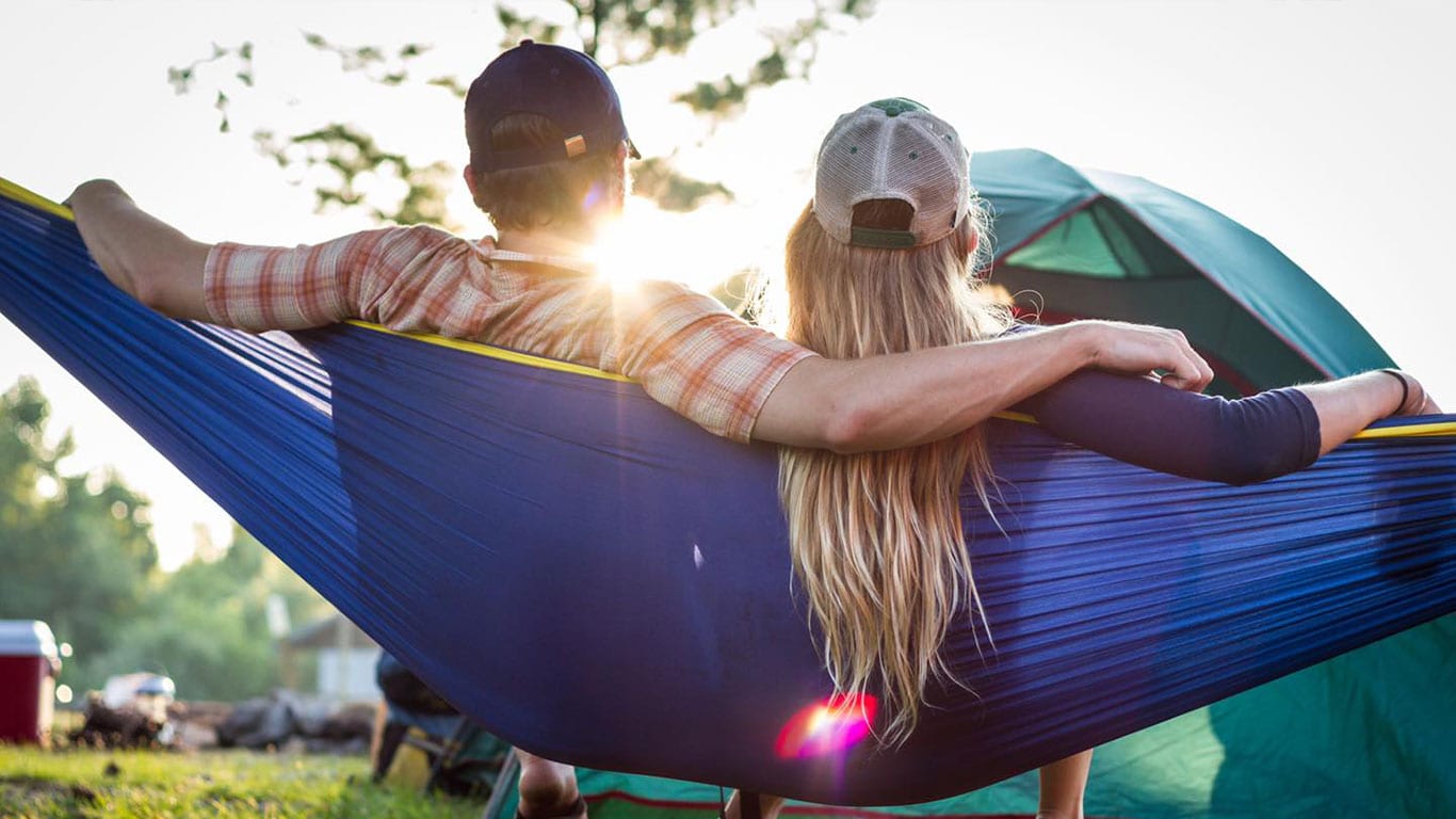 Couple relaxing in a hammock