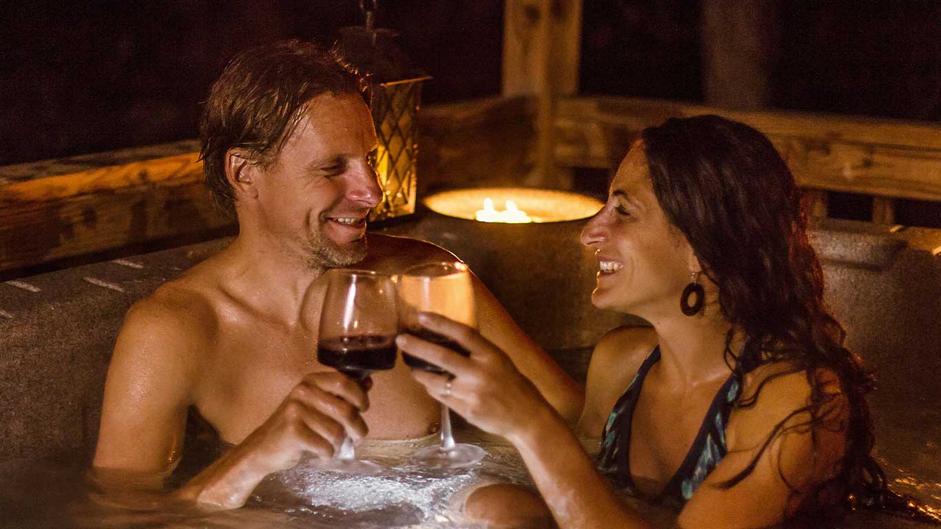 Couple relaxing in hot tub