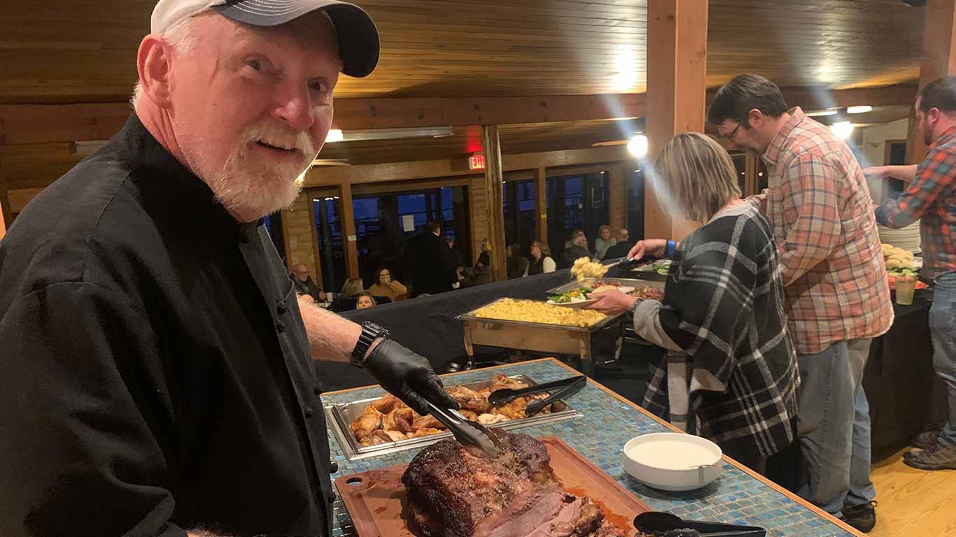 Dinner being served at Murder Mystery Dinner