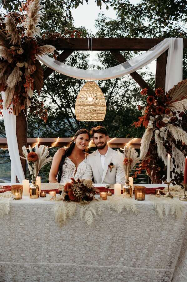 Fall Wedding Couple at their sweetheart table.